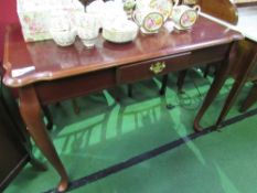 Modern mahogany reproduction occasional table with frieze drawer, 107cms x 56cms x 77cms.