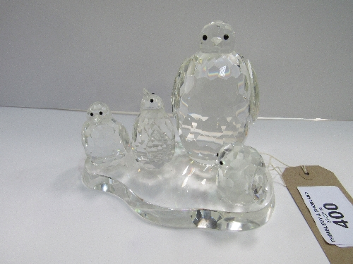 Crystal penguin family. Estimate £10-20.