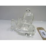 Crystal penguin family. Estimate £10-20.