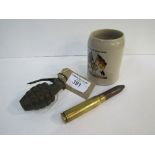 WWII US Army practice grenade, a 20mm shell & a ceramic Military Police shooting mug. Estimate £10-