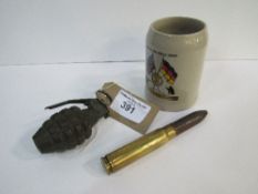 WWII US Army practice grenade, a 20mm shell & a ceramic Military Police shooting mug. Estimate £10-