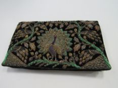 Hand stitched clutch bag brought back from Burma in WWII. Estimate £20-30.