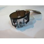 Hermes-style black crocodile collier de chine CDC bracelet. Estimate £10-20.