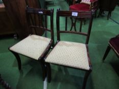 2 mahogany framed upholstered seat dining chairs. Estimate £10-20.