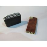 2 Colibri monogas lighters & a brown enamel electric. Estimate £10-20.