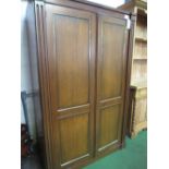 Stag mahogany double wardrobe with brass detail, 122cms x 194cms x 58cms. Estimate £10-20.