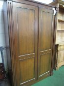 Stag mahogany double wardrobe with brass detail, 122cms x 194cms x 58cms. Estimate £10-20.