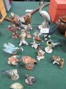 Qty of bird figurines: 6 Royal Worcester, 8 German porcelain & 3 others. Estimate £20-40.