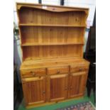Pine dresser, 120cms x 45cms x 175cms. Estimate £30-50.