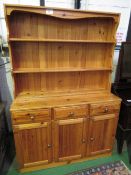 Pine dresser, 120cms x 45cms x 175cms. Estimate £30-50.