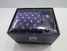 William Hunt (Saville Row) silk tie & cufflink set. Estimate £10-20.