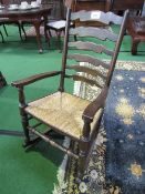 Rocking chair with rattan seat