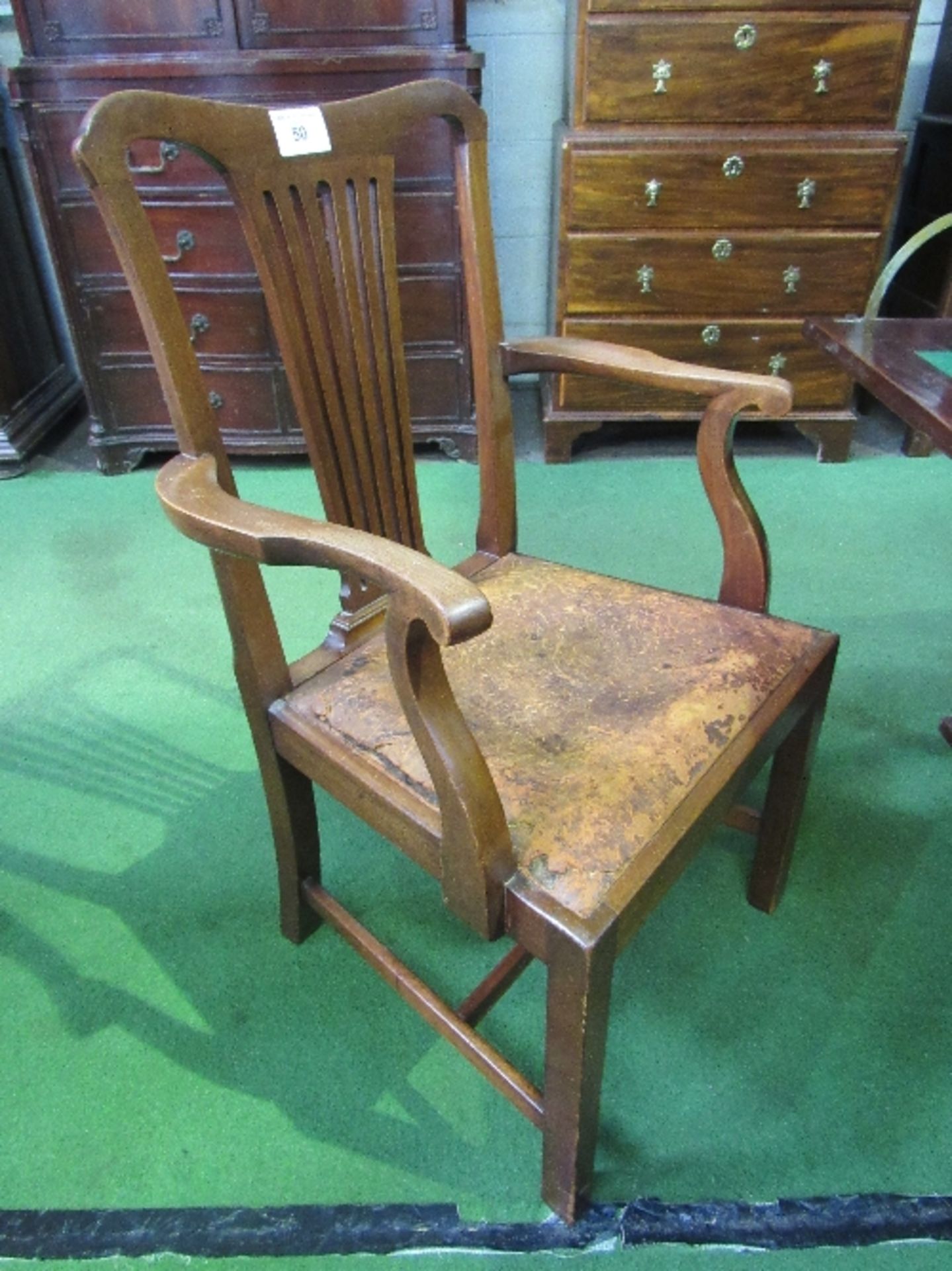 Mahogany framed carver with leather seat & railed splat. Estimate £5-10.
