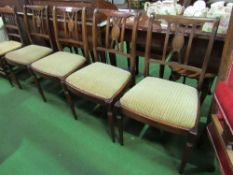 Set of 4 mahogany drop-in seat dining chairs. Estimate £20-30.