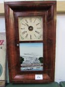 Mahogany cased American wall clock by Seth Thomas, with key, weight & pendulum. Estimate £35-50.