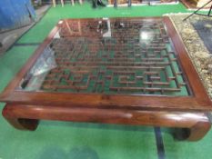 Chinese low table with bevel glass top, 1.3m x 1.3m. Estimate £60-80.
