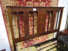 Edwardian inlaid mahogany double bedstead. Estimate £30-50.