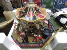 Maista 'Santa's Carousel Park' in original box. Estimate £50-60.