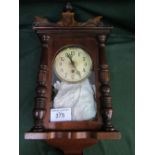 Small Vienna wall clock with Black Forest Eagle on top. Estimate £25-30.