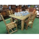 Mango wood kitchen table on block supports together with 4 matching chairs & 2 carvers. 195cms x