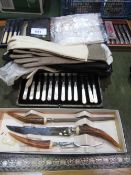 Qty of boxed cutlery, 6 pairs of leather evening gloves & 4 leather wallets. Estimate £20-40.