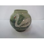 A Moorcroft pottery vase ‘Swan’ pattern, 250/350, artist David Tribe. Height – 17.5cms. Estimate £