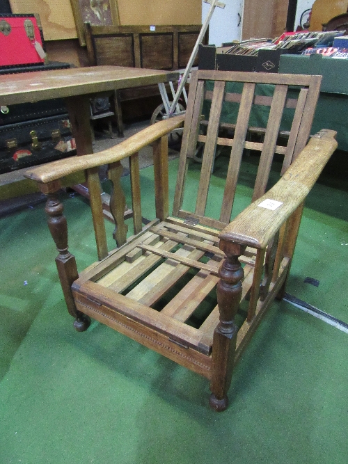 Oak framed Edwardian steam chair/day bed. Estimate £25-40.
