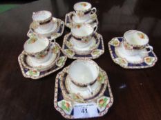 Colclough part tea set & German part tea set. Estimate £20-30.