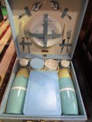 1960's Brexton picnic hamper with 4 place settings. Estimate £10-20.