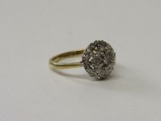 18ct gold & diamond cluster ring, wt 3.9gms, size M. Estimate £180-220.