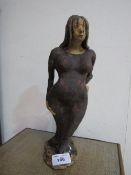 Modern British impressionist female statue. Estimate £30-40.