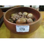 Large wooden bowl c/w treen fruit. Estimate £10-20.