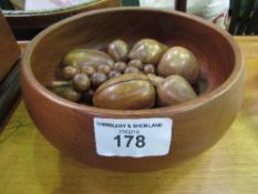 Large wooden bowl c/w treen fruit. Estimate £10-20.