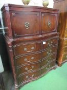 Mahogany serpentine front chest of 4 drawers with small linen press above & heavy brass mounts,