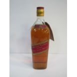 1.125 litre bottle of Johnnie Walker red label whisky. Estimate £12-18.
