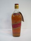 1.125 litre bottle of Johnnie Walker red label whisky. Estimate £12-18.