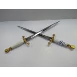 2 Wilkinson Sword daggers, engraved on blade. Estimate £15-25.