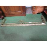 Brass fire fender. Estimate £10-15.