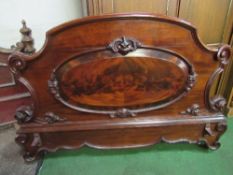 2 ornate mahogany double headboards. Estimate £30-50.