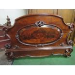 2 ornate mahogany double headboards. Estimate £30-50.