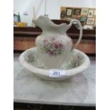 Ceramic wash bowl & jug. Estimate £5-10.