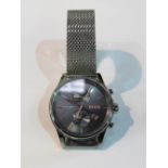 Hugo Boss chronograph watch with mesh strap. Estimate £70-80.