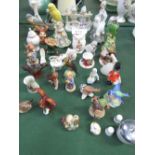 Large qty of figurines including Goebel & a pair of Beswick 1217 budgies. Estimate £15-25