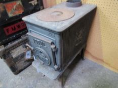 A JoTul 602 wood burning stove. Estimate £100-150.