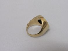 14k gold ring with a dos y medio pesos 1945 coin, total weight 9.3gms, size P. Estimate £80-120.