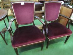 A pair of rosewood, upholstered carvers. Estimate £10-20.