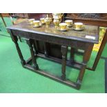 Oak occasional table with stretchers, 97cms x 38cms x 68cms. Estimate £30-50.