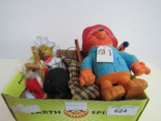 5 small puppets & a 1974 rubber Paddington Bear figure.  Estimate £10-15.