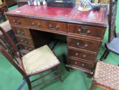 Mahogany pedestal desk with red leather skiver. Estimate £50-80