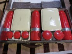 Vintage picnic set in original case. Estimate £10-20.